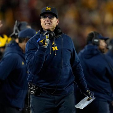 NCAA investigators interview Jim Harbaugh’s staff about sign-stealing scheme, AP source says