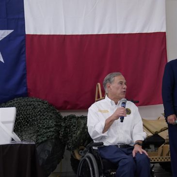 During visit to border, Texas governor endorses Trump