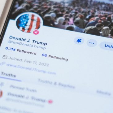 Trump’s social media company soars nearly 50% in its first day of trading on Nasdaq