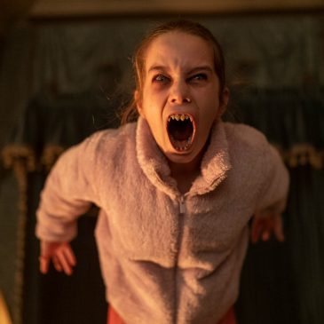Movie review: Radio Silence brings maximalist style to vampire flick ‘Abigail’
