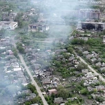 Drone footage shows Ukrainian village battered to ruins as residents flee Russian advance