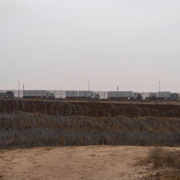 Israel’s pledge to guard an aid route into Gaza falls flat as lawlessness blocks distribution
