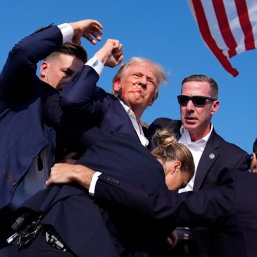 Trump is injured but ‘fine’ after apparent assassination attempt leaves rally-goer and gunman dead