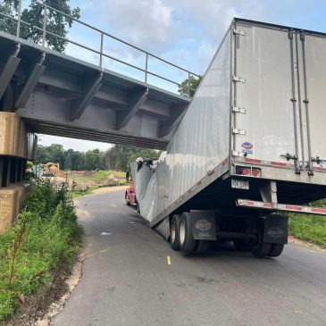 A bridge too low: Lost semi driver gets wedged beneath Cottage Grove span