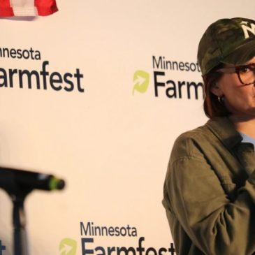 Tim Walz depicted as rural champion at Farmfest by Heidi Heitkamp and Peggy Flanagan