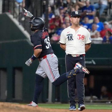 Twins hang on after Santana homer to beat Rangers again