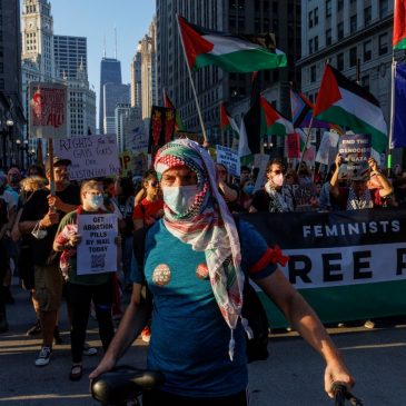 Pro-abortion rights and LGBTQ+ protesters rally ahead of the start of the DNC