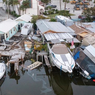 Supplies rushed to communities isolated by Helene as death toll rises to at least 107