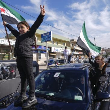 Jubilation and gunfire as Syrians celebrate the end of the Assad family’s half-century rule