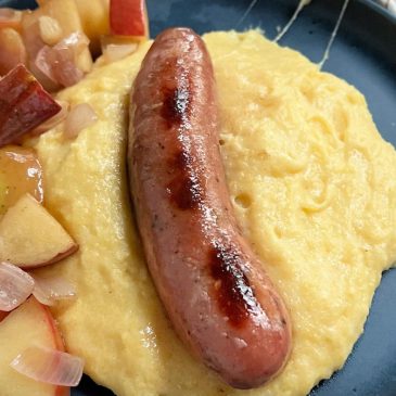 Recipe: Chicken and apple sausage with cheesy grits comes together in 10 minutes