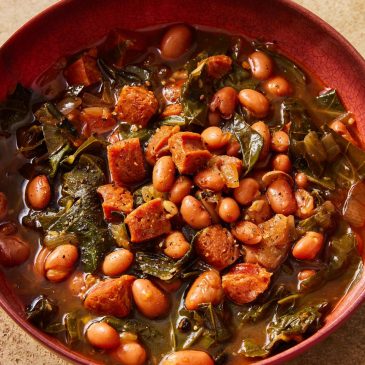 Flavorful chorizo brings meaty depth to a paprika pinto bean soup with collard greens