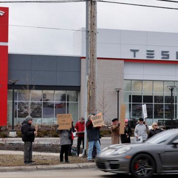 Woman suspected in Colorado Tesla dealership vandalism charged in federal court