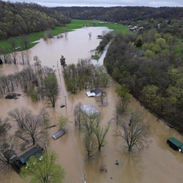 Swollen rivers flood towns in US South after dayslong deluge of rain