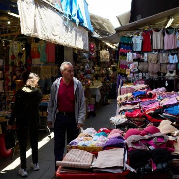 US inflation cools and Americans step up spending as they brace for tariff impact