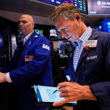 Wall Street loses ground and oil prices tumble after OPEC+ says it will step up production