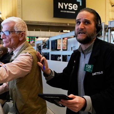 Wall Street wobbles ahead of new retail sales data and public appearances by Fed officials