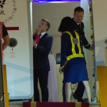 Watch: France’s first lady seems to push her husband as they land in Vietnam. He says they were joking