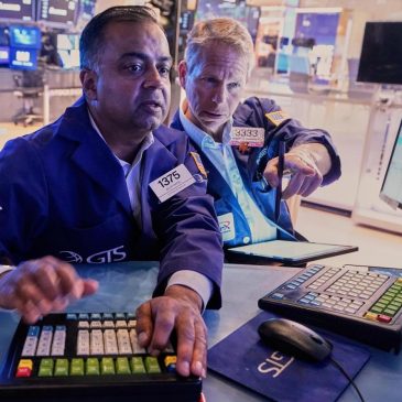 US stocks hang near their record as Wall Street takes a breath following two big days