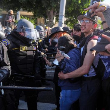 Trump vows to ‘HIT’ any protester who spits on police. He pardoned those who did far worse on Jan. 6