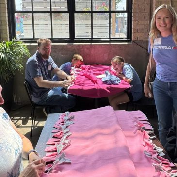 Volunteers make 100 blankets in St. Paul for homeless outreach event