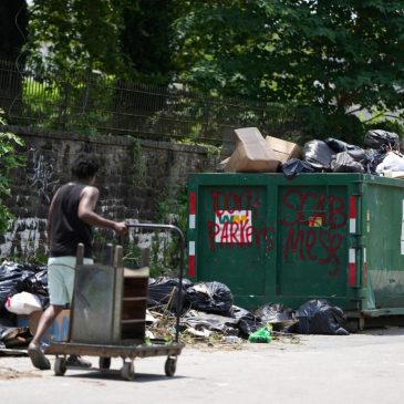 Philadelphia workers and city reach a deal to end strike that halted residential trash pickup