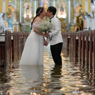 Photos: Filipino couple marry in typhoon-flooded church