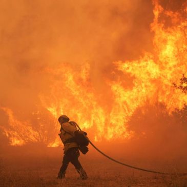 Scientists give harsh grades to Trump administration work aimed at undoing a key climate finding