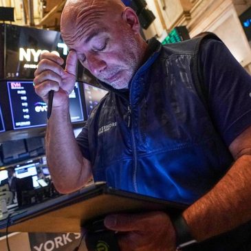 Wall Street holds steady following mixed profit reports from McDonald’s, Disney and Shopify
