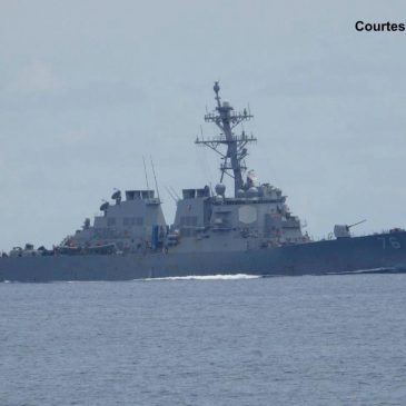 US briefly deploys 2 warships to a disputed South China Sea shoal after Chinese collision