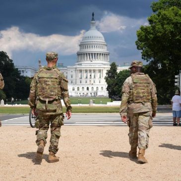 National Guard vehicle collides with civilian car near US Capitol, trapping one person