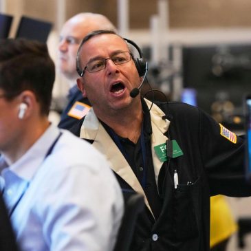 Wall Street drifts around its records, propped up by hopes for cuts to interest rates