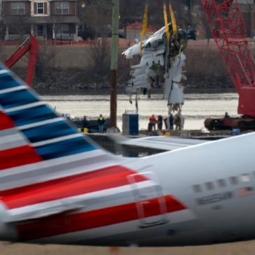 Family of 1 of the 67 Washington plane crash victims sues the FAA, Army and American Airlines