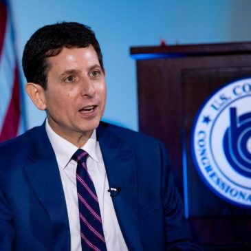 He’s the budget scorekeeper for Congress. Lately, it’s been a tough job