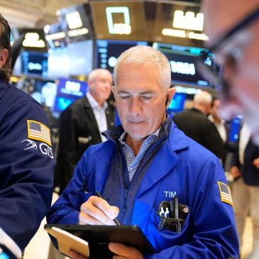 Wall Street holds steady following the latest signals that the job market is slowing