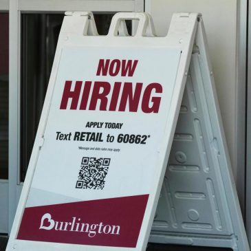 Fewer Americans file for jobless benefits last week despite signs of a slowing labor market