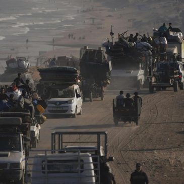 Israeli troops press forward into Gaza City as Palestinians flee