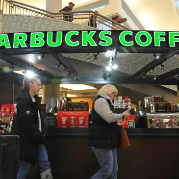 Starbucks to close hundreds of stores, lay off 900 workers as part of turnaround plan