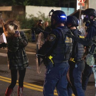 Portland braces for federal troops as protests escalate and conservative influencer is arrested