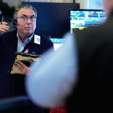 US stocks hang near their records as tech keeps climbing