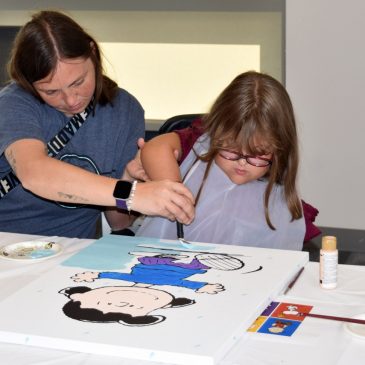 Woodbury: Kids paint ‘Peanuts’ mural at Shriners Children’s hospital between visits