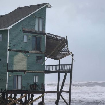 Dozens rescued as remnants of typhoon hits Alaska while nor’easter brings flooding to East Coast