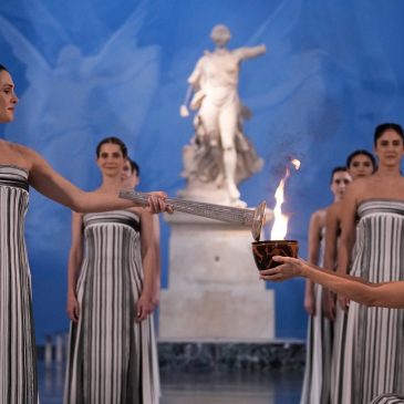 Under a cloud, the Olympic flame begins its journey to the Milan Cortina Winter Olympics