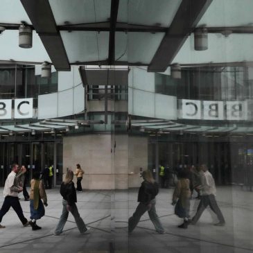 BBC leaders grilled by lawmakers over its standards after Trump threatened to sue