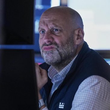 Wall Street slips and is headed for a losing week