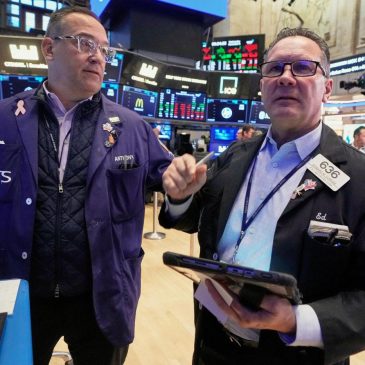 US stocks slip in morning trading as more companies report their results