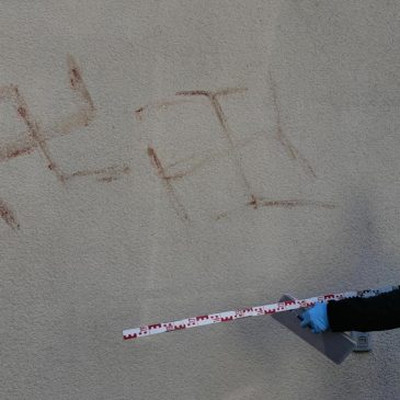 Police detain man who allegedly painted swastikas with his own blood on cars, buildings in Germany