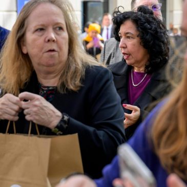 Photos of Americans turning to food pantries as shutdown drags on