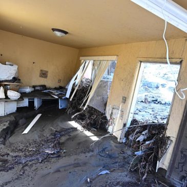 Rain-soaked California still at risk of floods and high surf