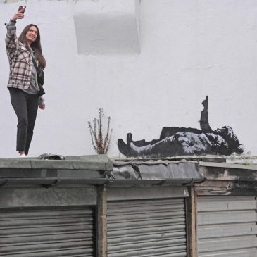 Banksy unveils new art in London following speculation over murals depicting stargazing figures