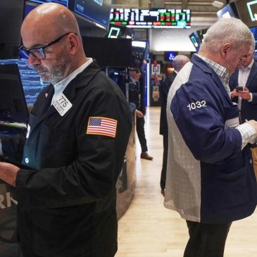 Wall Street holds stronger as bond yields and bitcoin stabilize